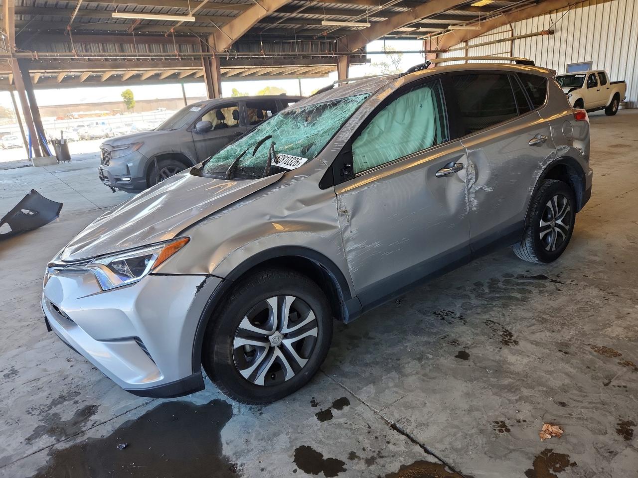 2016 Toyota RAV4 LE, VIN 2T3ZFREV2GW291959 — Rollover
