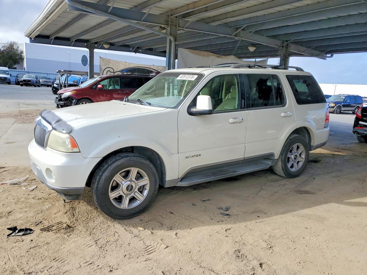 2004 Lincoln Aviator Luxury, VIN 5LMEU88HX4ZJ01060 — Мелкие вмятины и царапины