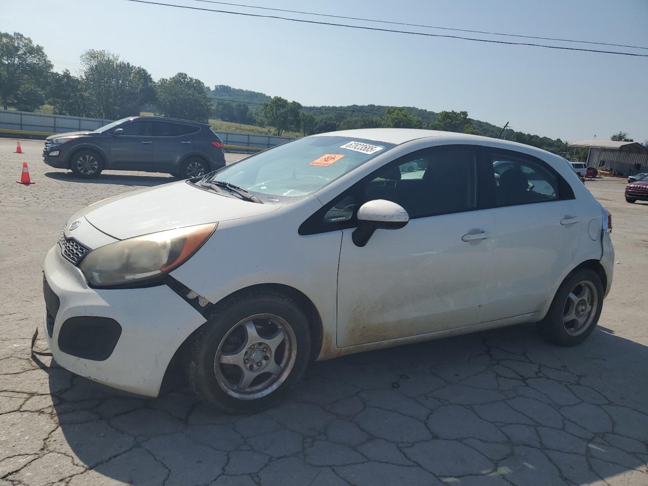 2013 Kia Rio LX, VIN KNADM5A35D6104348 — Rear end