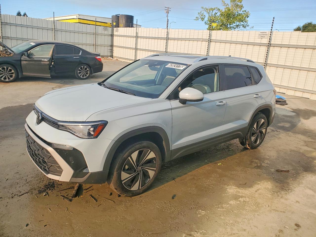 2025 Volkswagen Taos SE, VIN 3VVVC7B28SM034550 — Minor dents and scratches