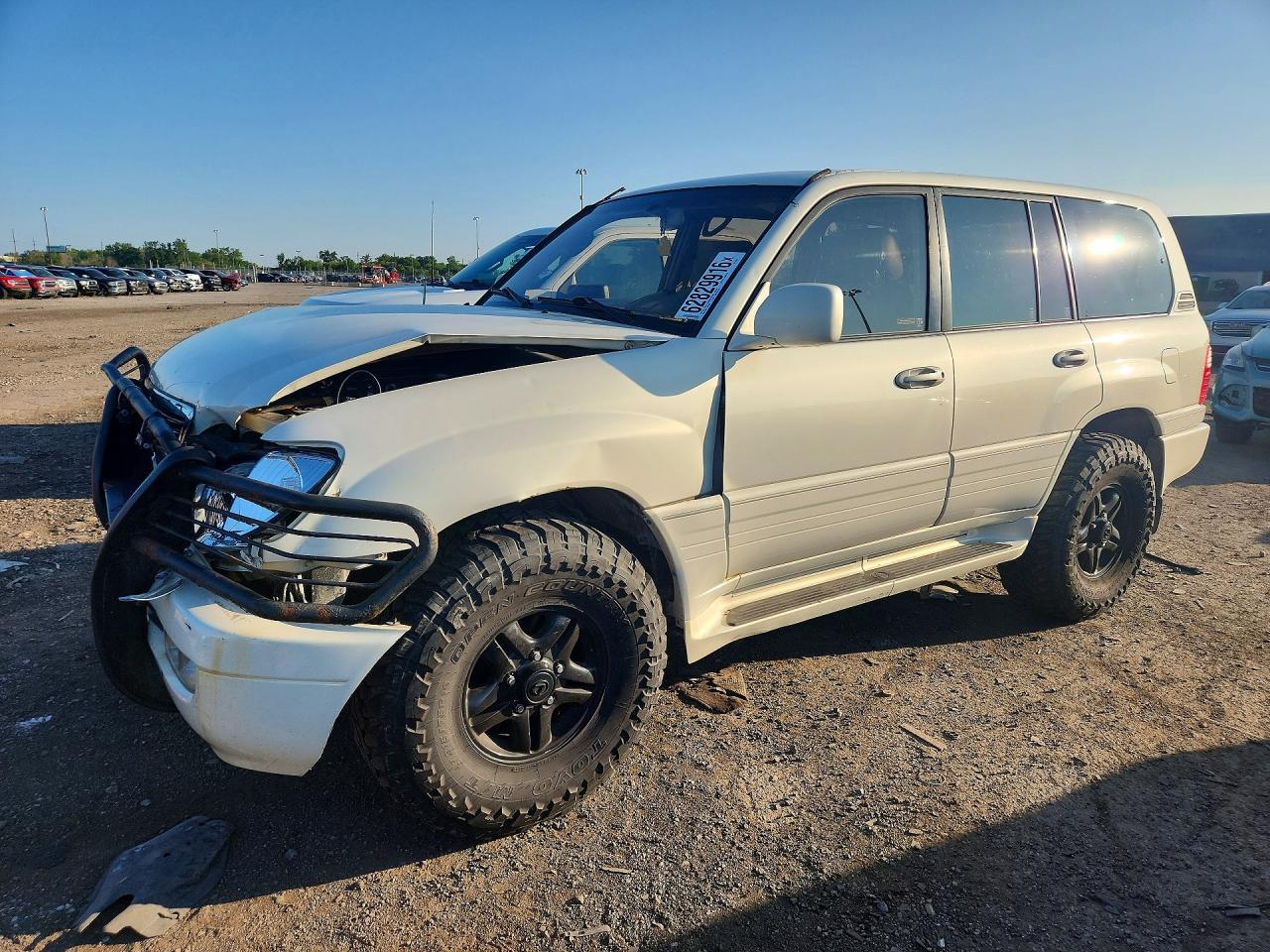 2002 Lexus LX 470, VIN JTJHT00WX23518906 — Front end