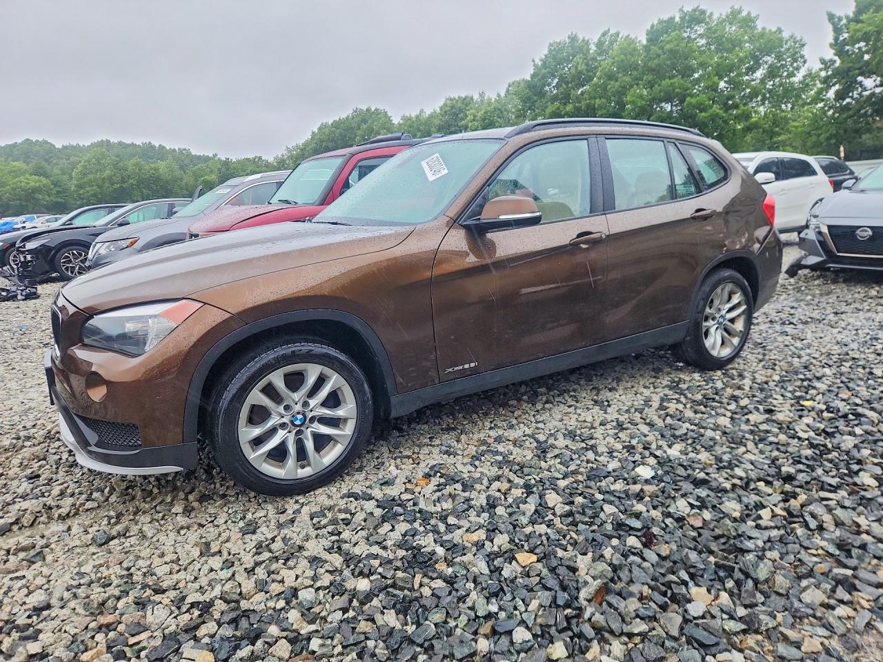 2015 BMW X1 xDrive28i, VIN WBAVL1C5XFVY34621 — Rear end