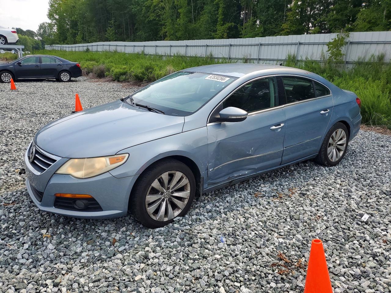 2009 Volkswagen CC Sport, VIN WVWNL73C39E523055 — Бок