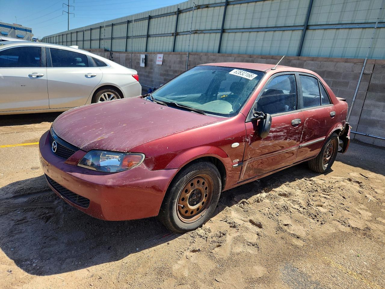 2002 Mazda Protege DX, VIN JM1BJ225020603916 — Зад