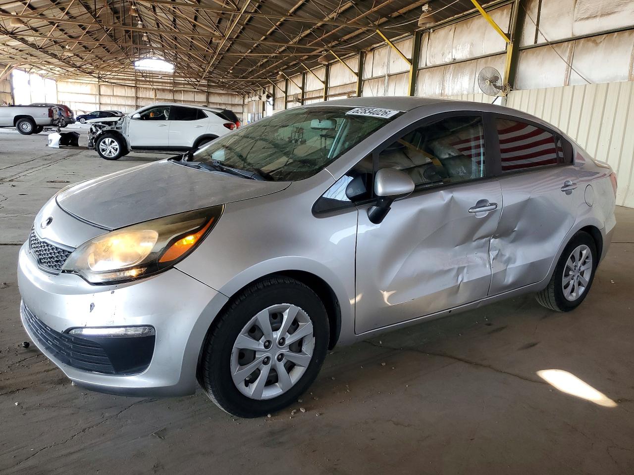 2017 Kia Rio LX, VIN KNADM4A37H6025795 — Бок