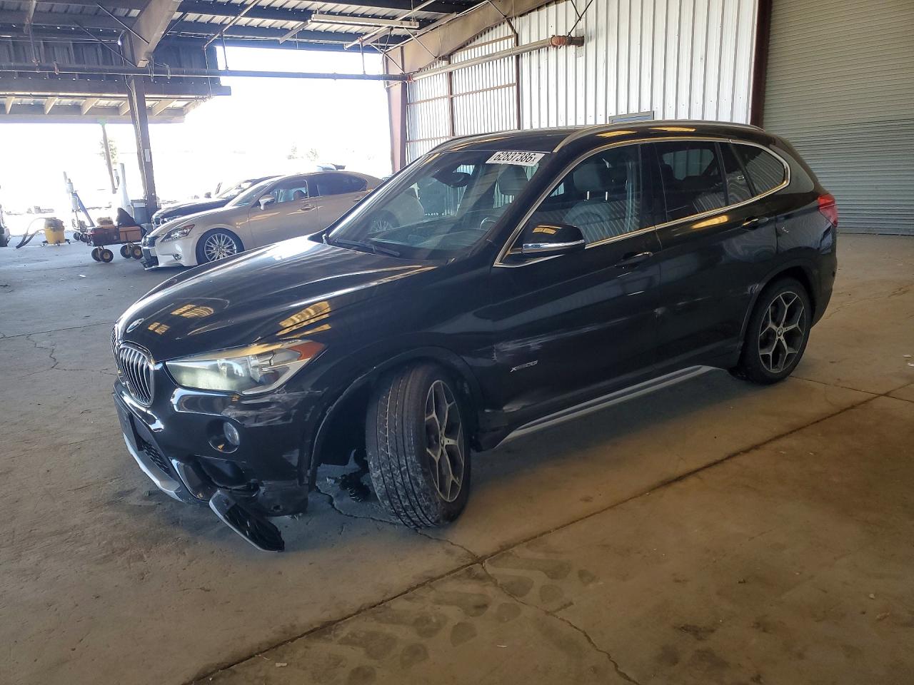 2016 BMW X1 xDrive28i, VIN WBXHT3C31GP884035 — Front end