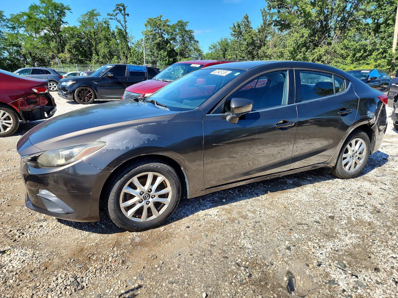 2014 Mazda 3 i Touring, VIN JM1BM1V79E1183893 — Бок