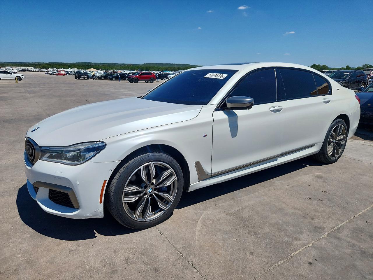 2019 BMW 7 Series M760i xDrive, VIN WBA7H6C58KG615050 — Обычный износ