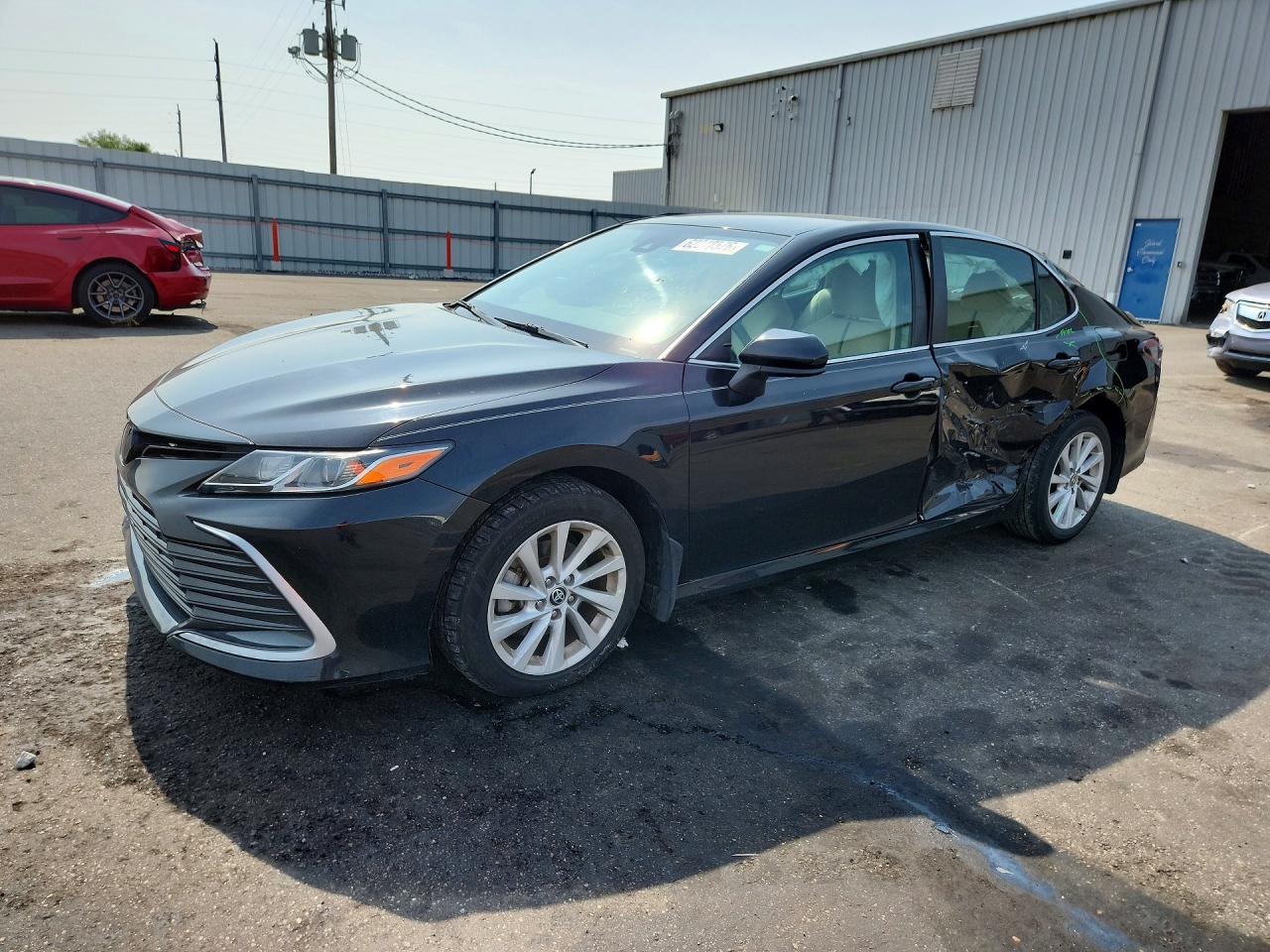 2022 Toyota Camry LE, VIN 4T1C11AK9NU677141 — Side