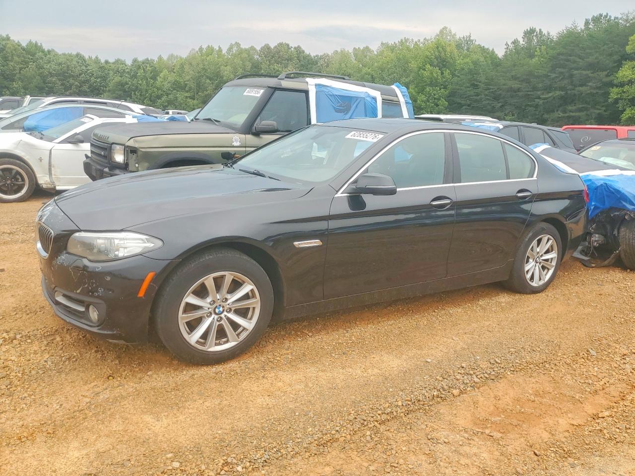 2016 BMW 5 Series 528i xDrive, VIN WBA5A7C57GG151502 — Side
