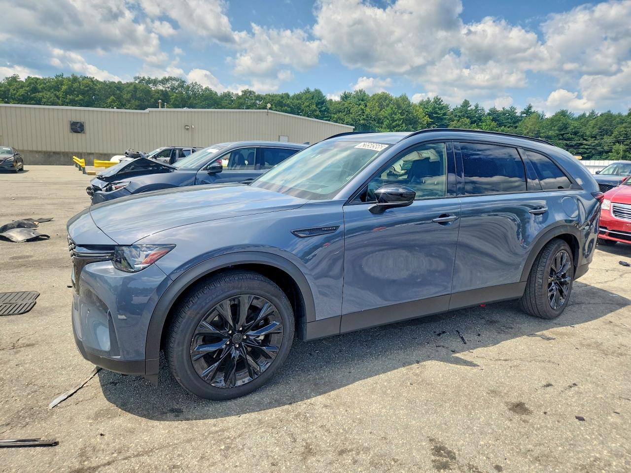 2026 Mazda CX-90 Premium Sport, VIN JM3KKCHDXT1358868 — Rear end