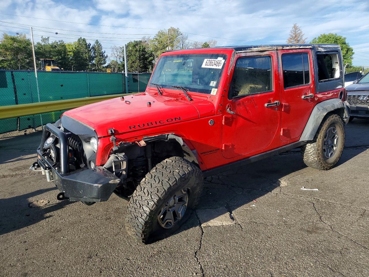 2015 Jeep Wrangler Unlimited Rubicon, VIN 1C4BJWFG6FL645207 — Rollover