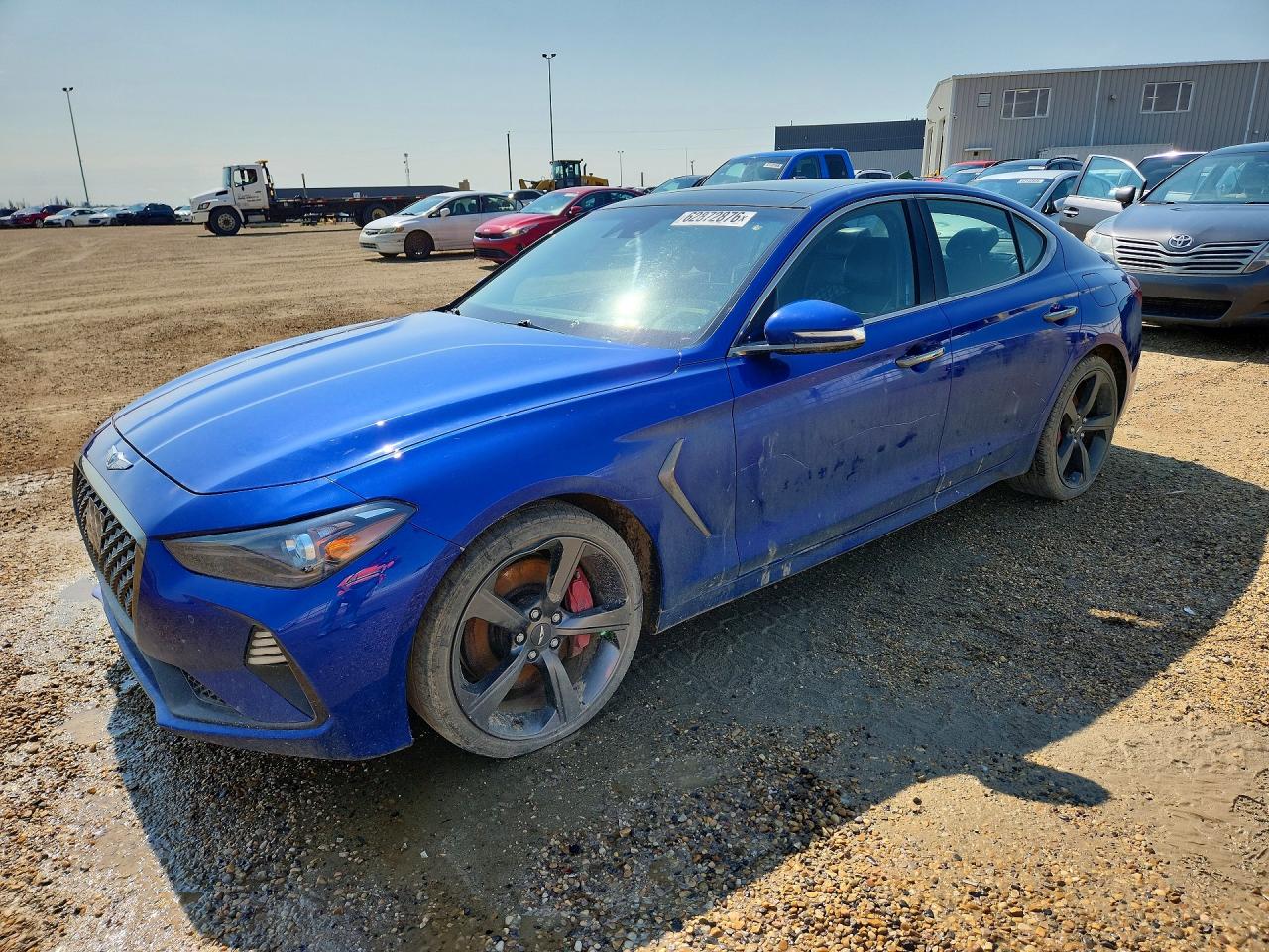 2020 Genesis G70 3.3T, VIN KMTG74LE7LU055276 — Side