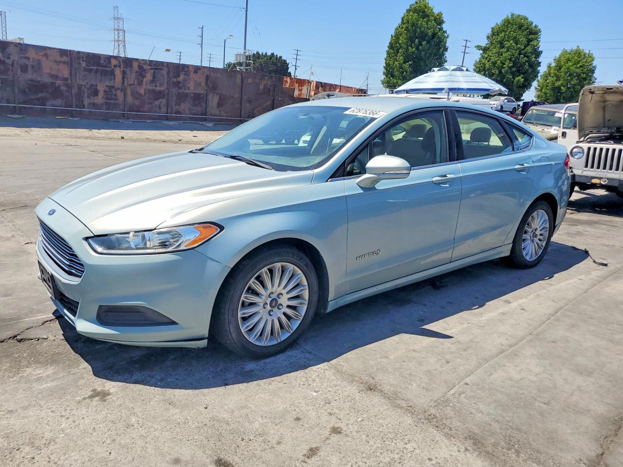 2014 Ford Fusion SE Hybrid, VIN 3FA6P0LUXER179326 — Rear end
