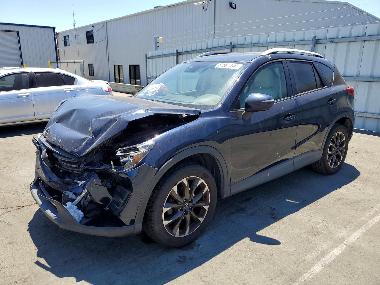 2016 Mazda CX-5 Grand Touring, VIN JM3KE2DY7G0611165 — Front end