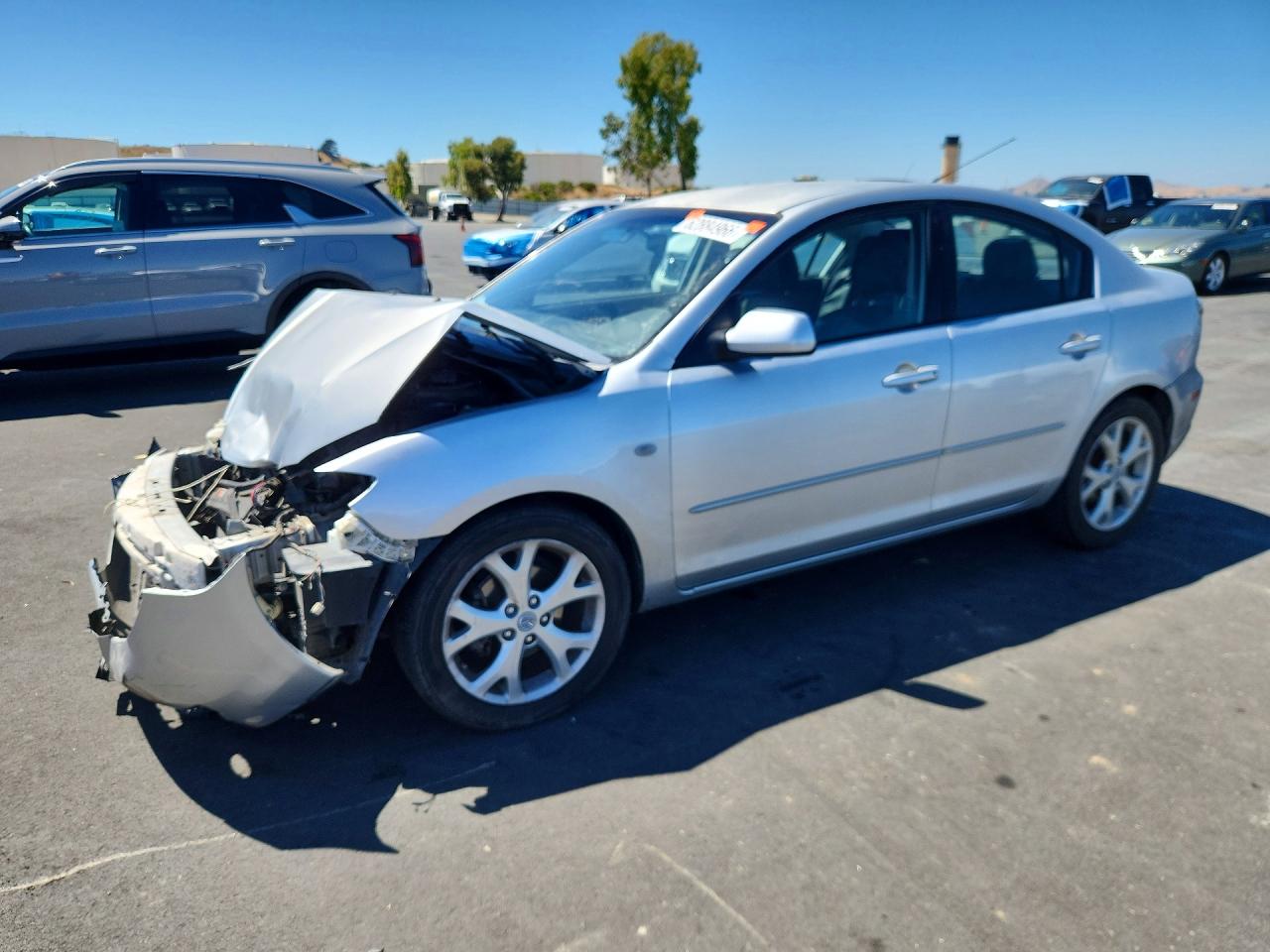 2009 Mazda 3 i Touring Value, VIN JM1BK32G691245570 — Перед