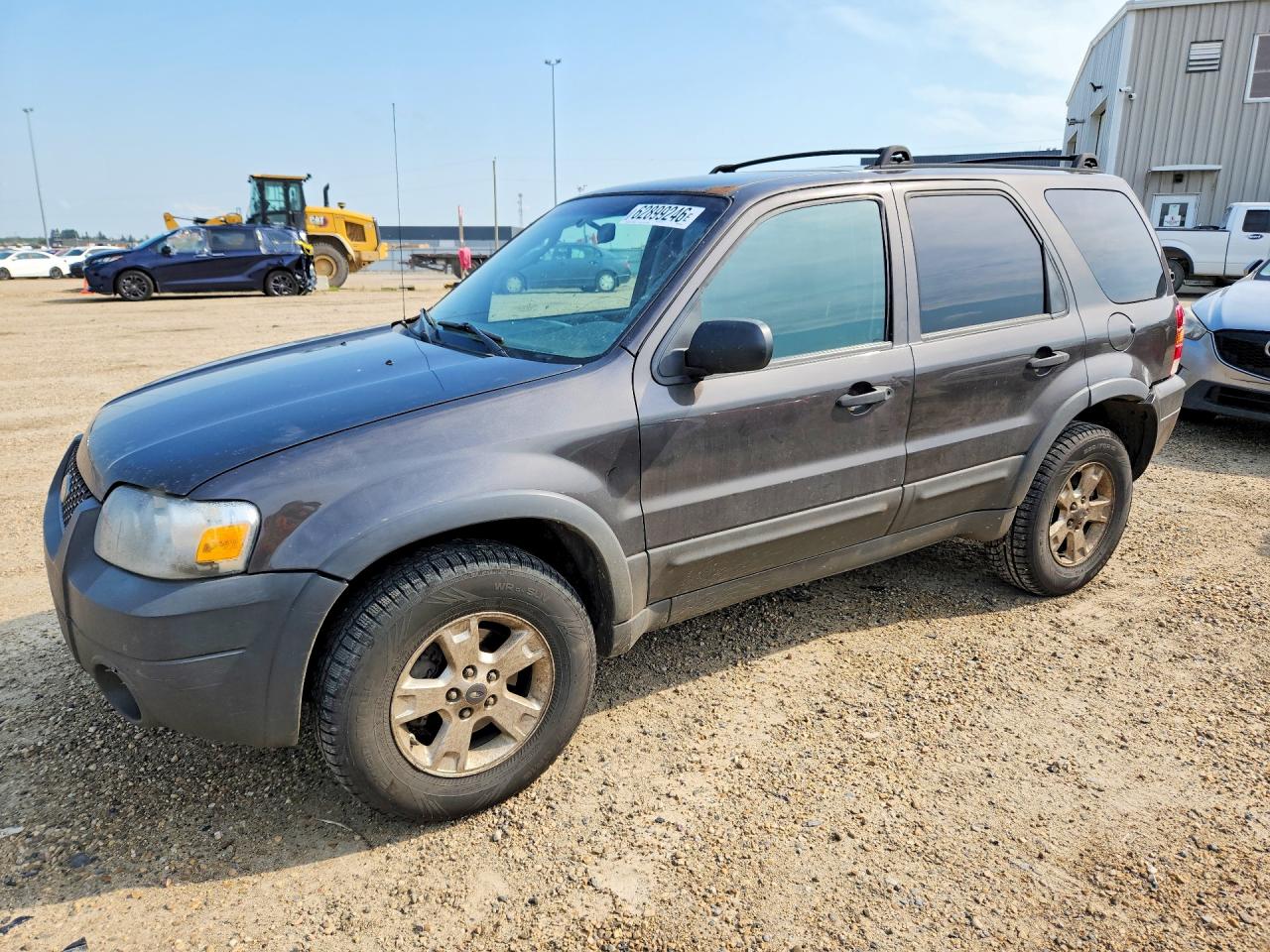 2007 Ford Escape XLT, VIN 1FMYU93127KA23189 — Side