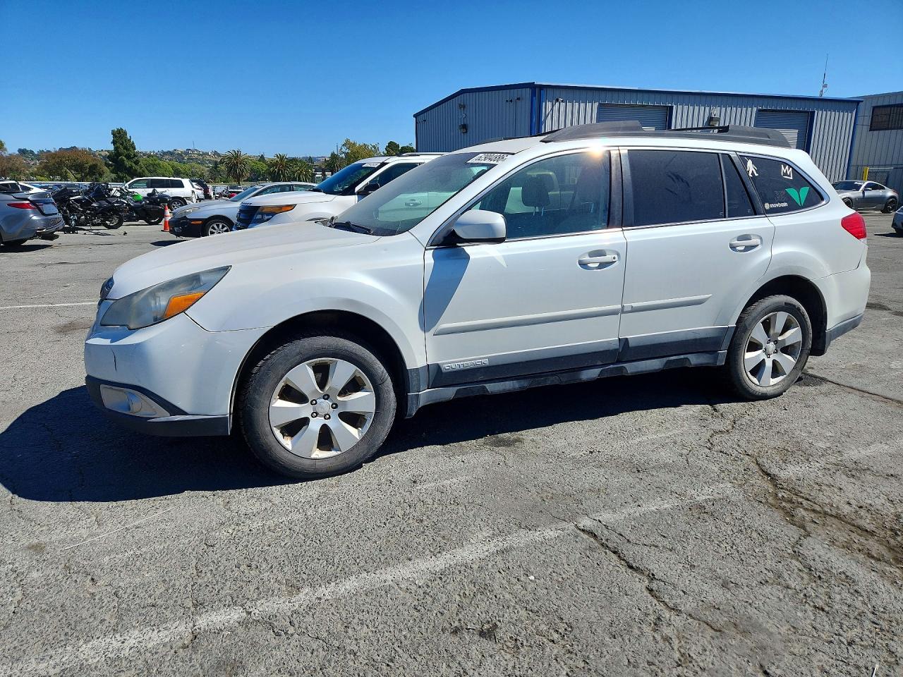 2012 Subaru Outback Prem, VIN 4S4BRBCC0C3209513 — Minor dents and scratches