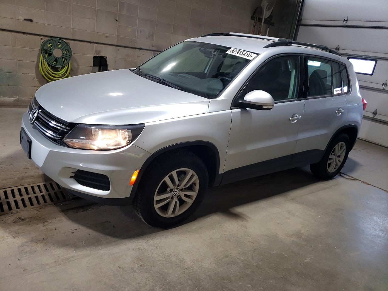 2016 Volkswagen Tiguan SEL, VIN WVGBV7AX0GW604486 — Hail