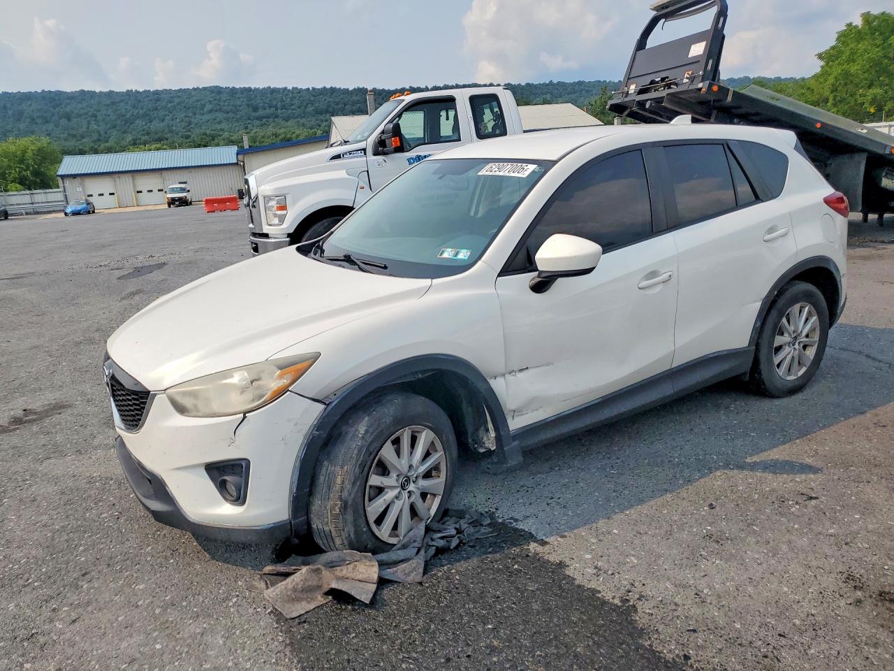 2013 Mazda CX-5 Sport, VIN JM3KE2BE5D0103071 — Front end