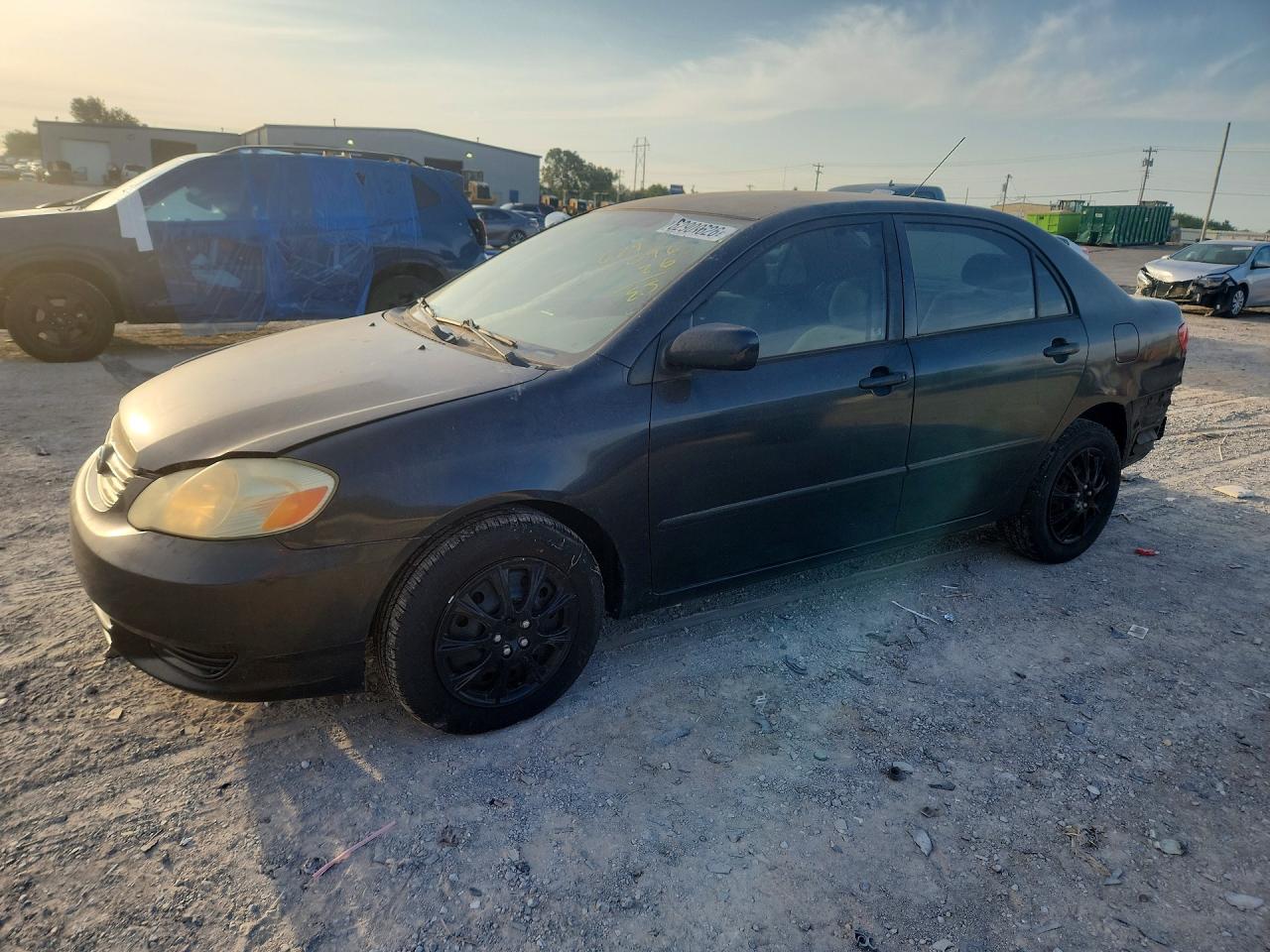 2003 Toyota Corolla CE, VIN 1NXBR32EX3Z075354 — Front end