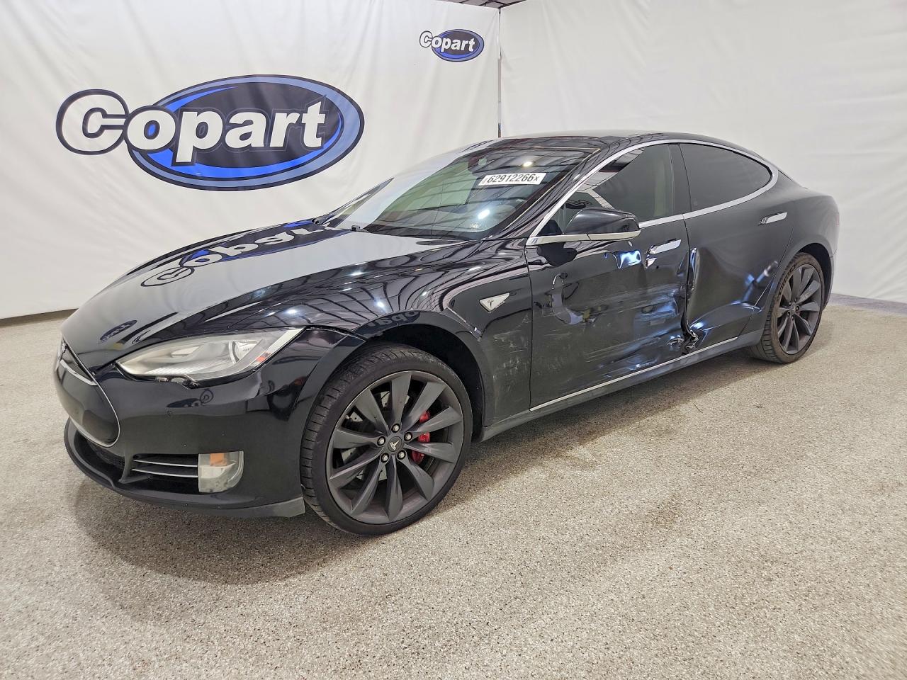 2014 Tesla Model S 60, VIN 5YJSA1H19EFP45251 — Бок