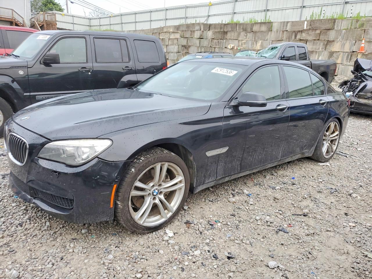 2015 BMW 7 Series 740i, VIN WBAYA6C50FGK16292 — Undercarriage
