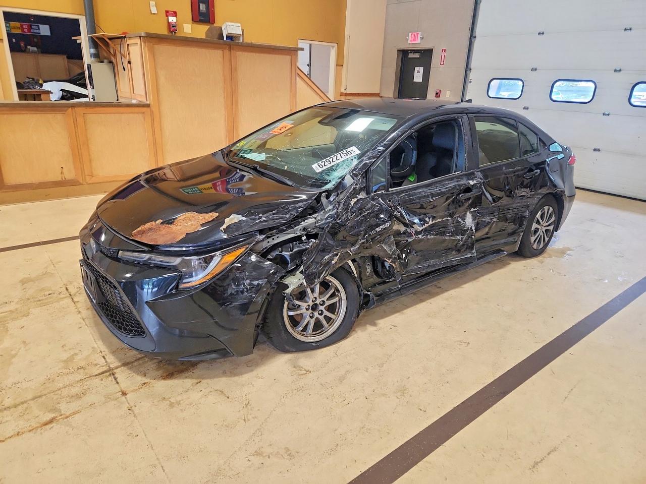 2021 Toyota Corolla Hybrid LE, VIN JTDEAMDE1MJ001853 — Front end