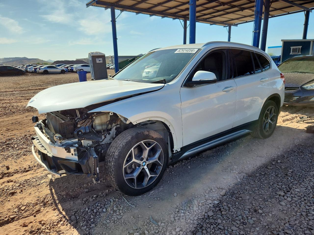 2018 BMW X1 xDrive28i, VIN WBXHT3C37J3H33430 — Front end