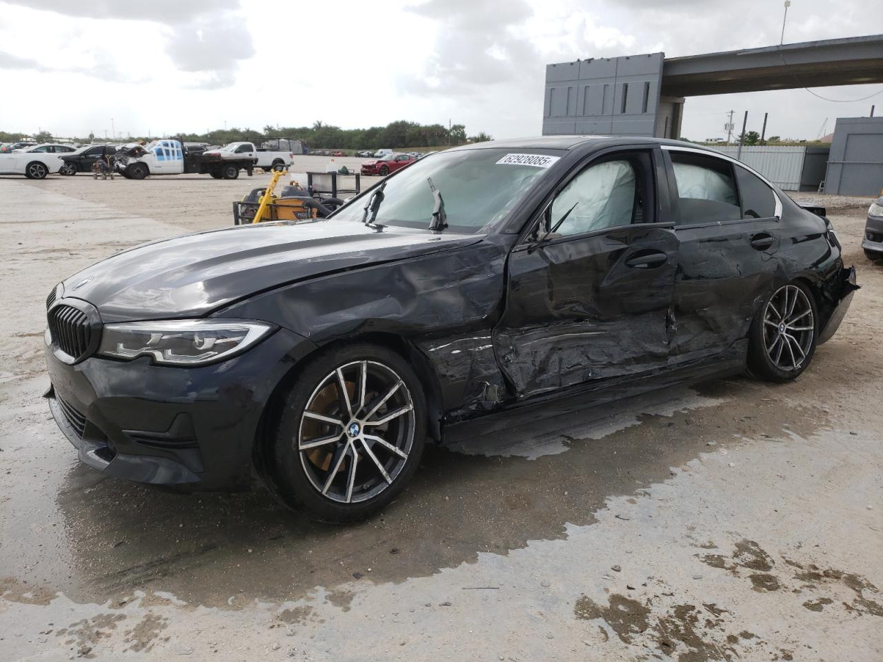2019 BMW 3 Series 330i, VIN 3MW5R1J55K8B00371 — Side