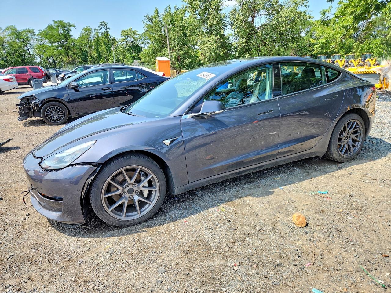 2019 Tesla Model 3 Long Range, VIN 5YJ3E1EB1KF386026 — Front end