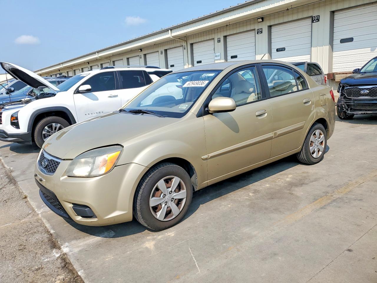 2011 Kia Rio LX, VIN KNADH4A39B6734143 — Зад