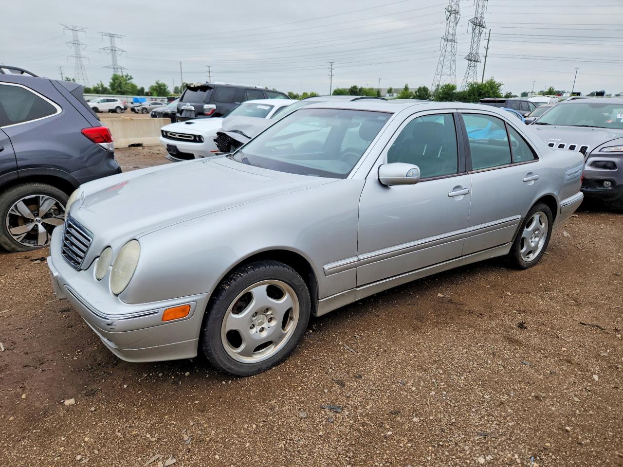 2001 Mercedes-Benz E 320/430 4 Matic, VIN WDBJF83J61X053203 — Minor dents and scratches
