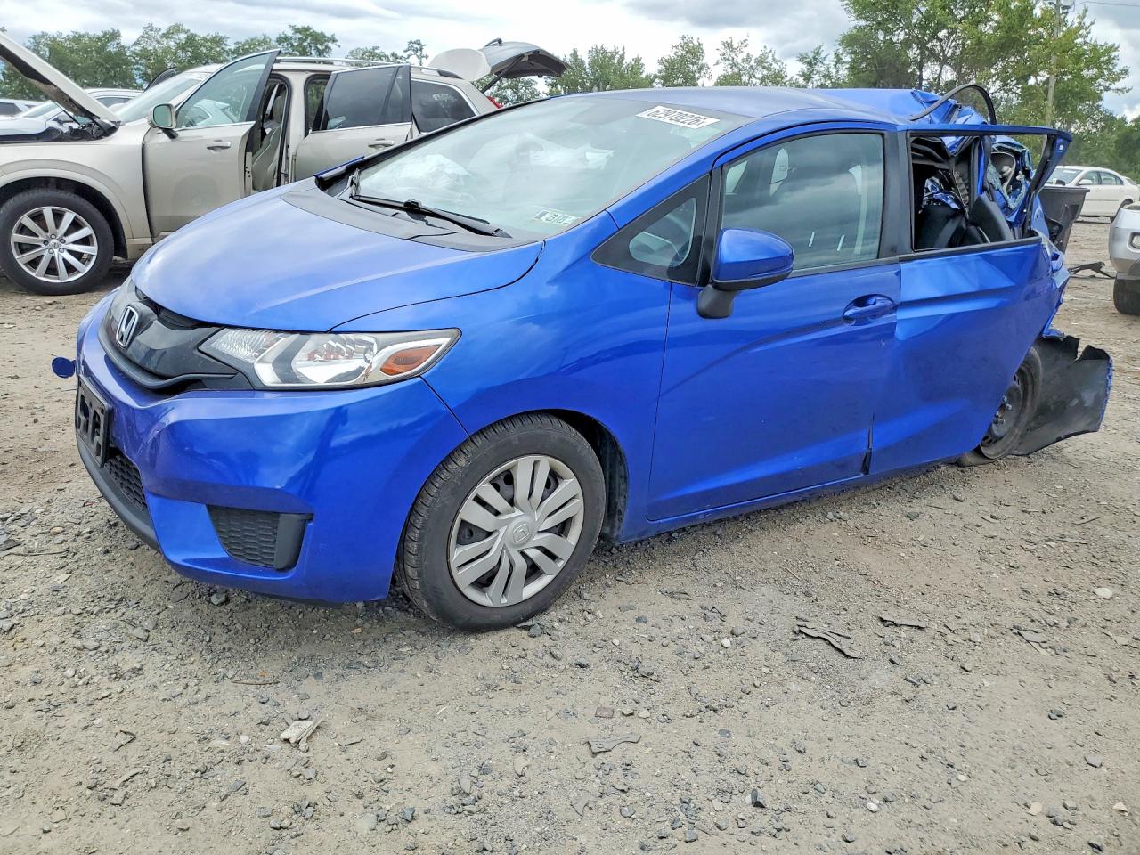 2016 Honda Fit LX, VIN JHMGK5H5XGX017345 — Зад