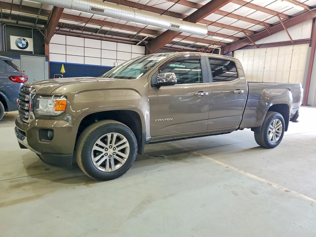 2016 GMC Canyon 4WD SLT, VIN 1GTP6DE10G1325113 — Minor dents and scratches