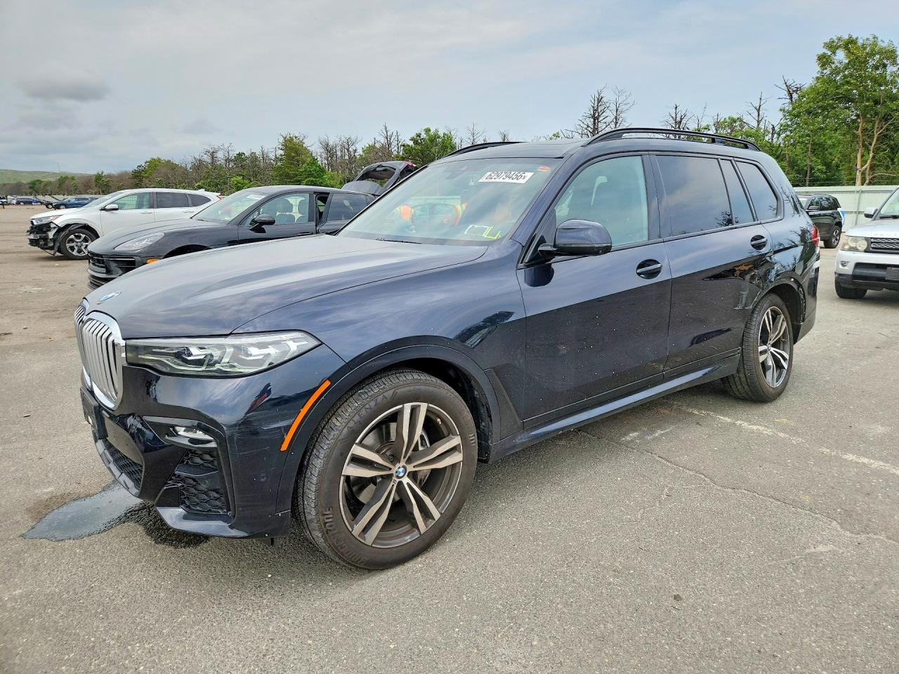 2022 BMW X7 xDrive40i, VIN 5UXCW2C02N9K23354 — Side