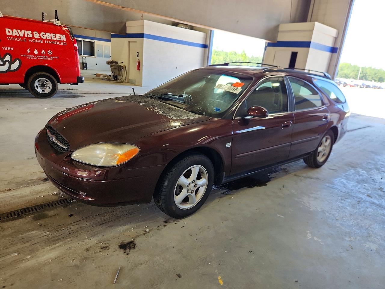 2000 Ford Taurus SE, VIN 1FAFP58S0YA232280 — Engine fire