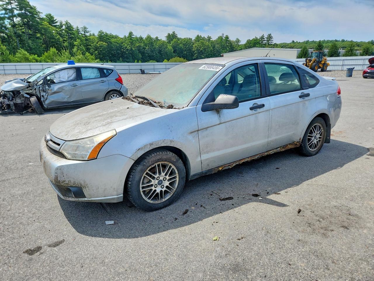 2011 Ford Focus SE, VIN 1FAHP3FN3BW183371 — Normal wear