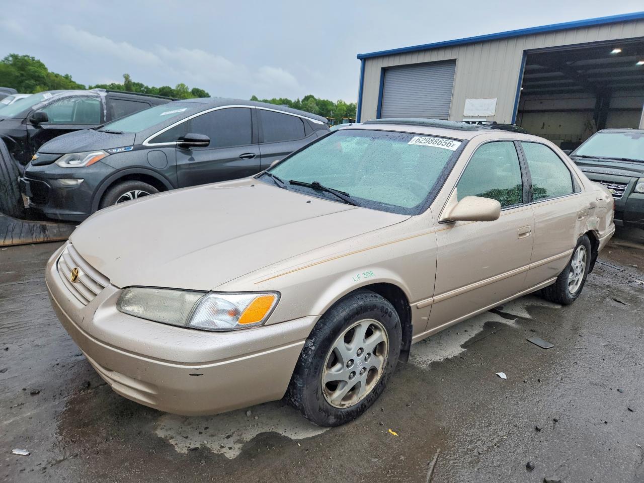 1997 Toyota Camry LE, VIN 4T1BF22K0VU008578 — Side