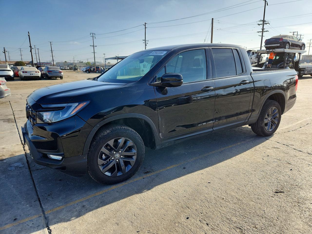 2025 Honda Ridgeline Sport, VIN 5FPYK3F18SB035024 — Front end