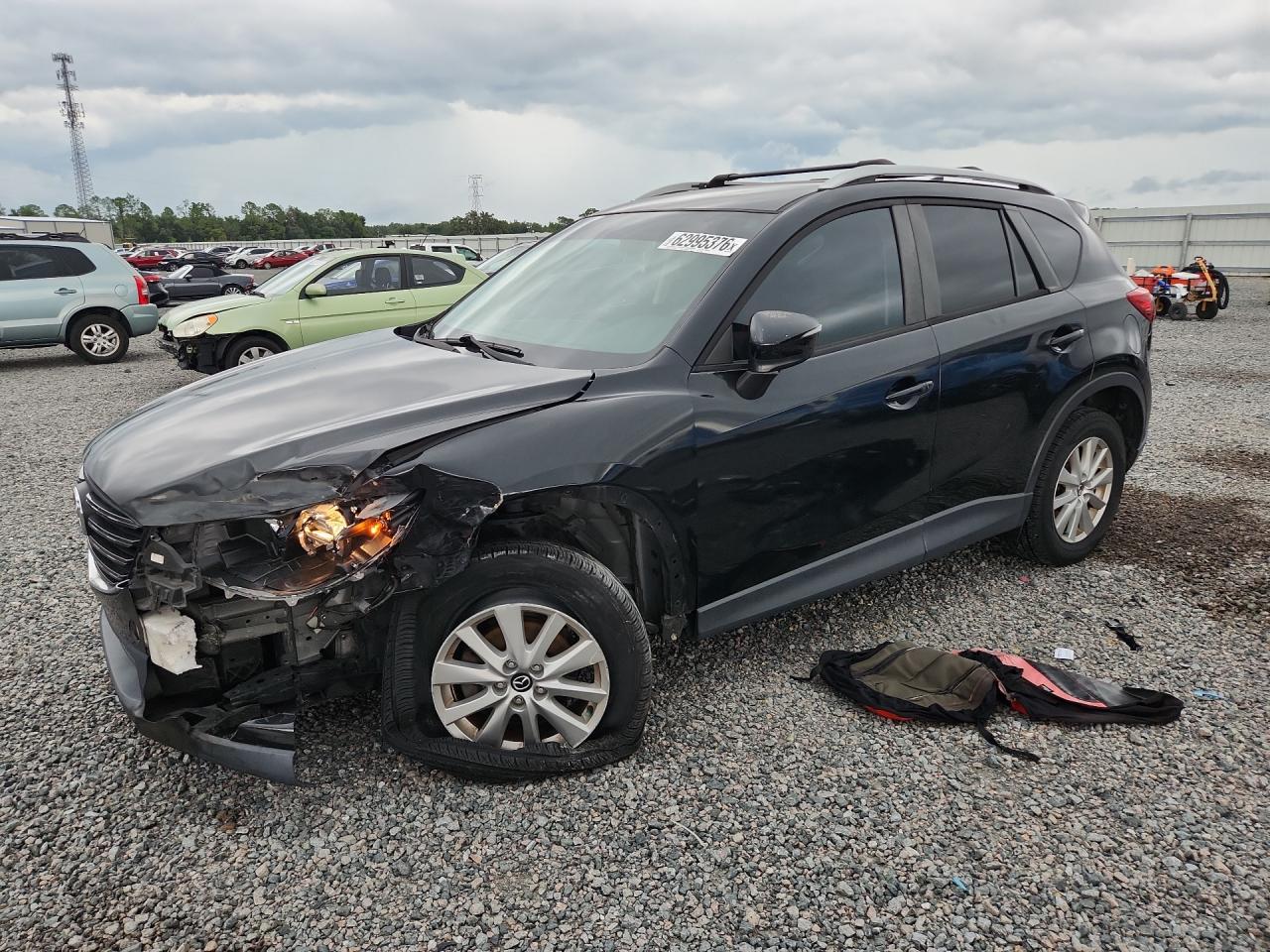 2016 Mazda CX-5 Touring, VIN JM3KE2CY8G0701720 — Перед