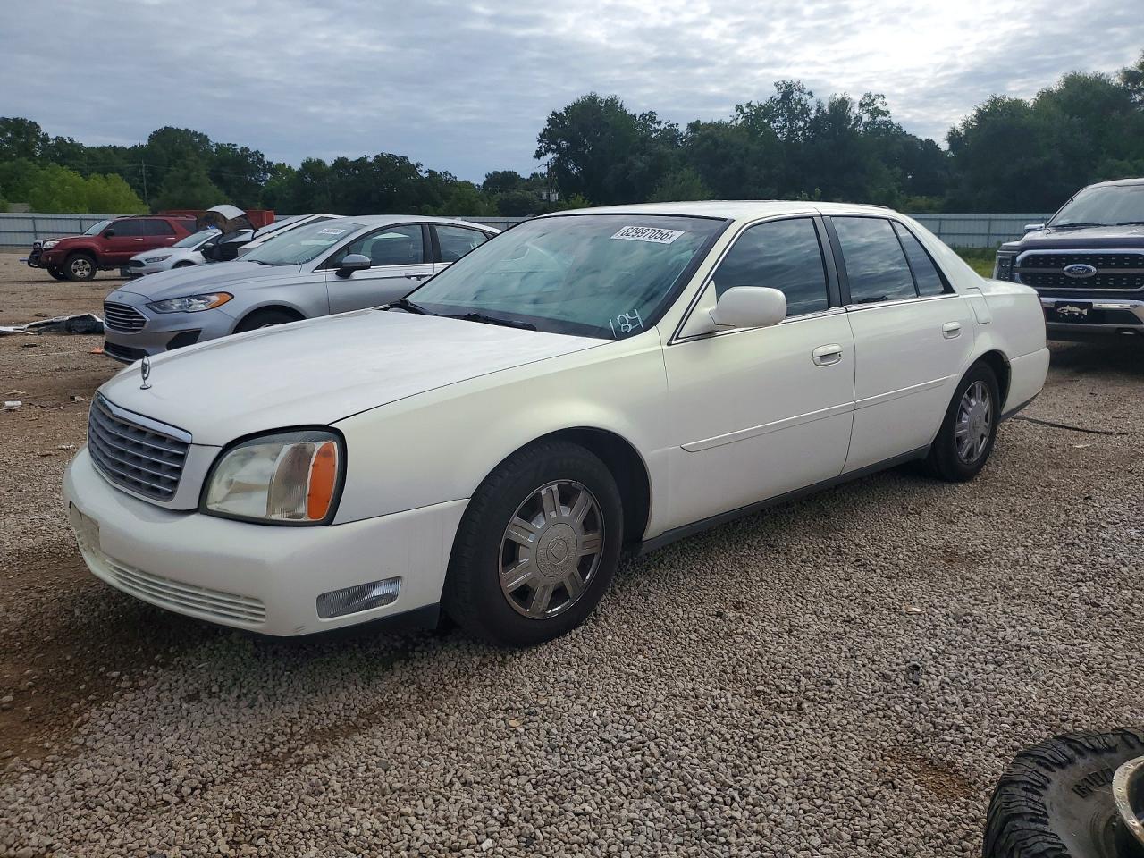 2004 Cadillac DeVille, VIN 1G6KD54Y94U148921 — Minor dents and scratches