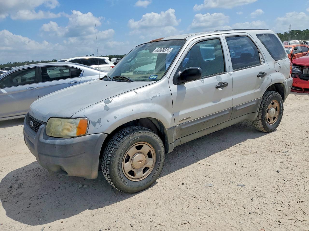 2002 Ford Escape XLS Value, VIN 1FMYU01B62KA44420 — Мелкие вмятины и царапины