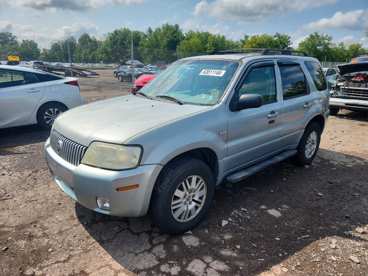 2006 Mercury Mariner Luxury, VIN 4M2CU57196KJ05267 — Бок