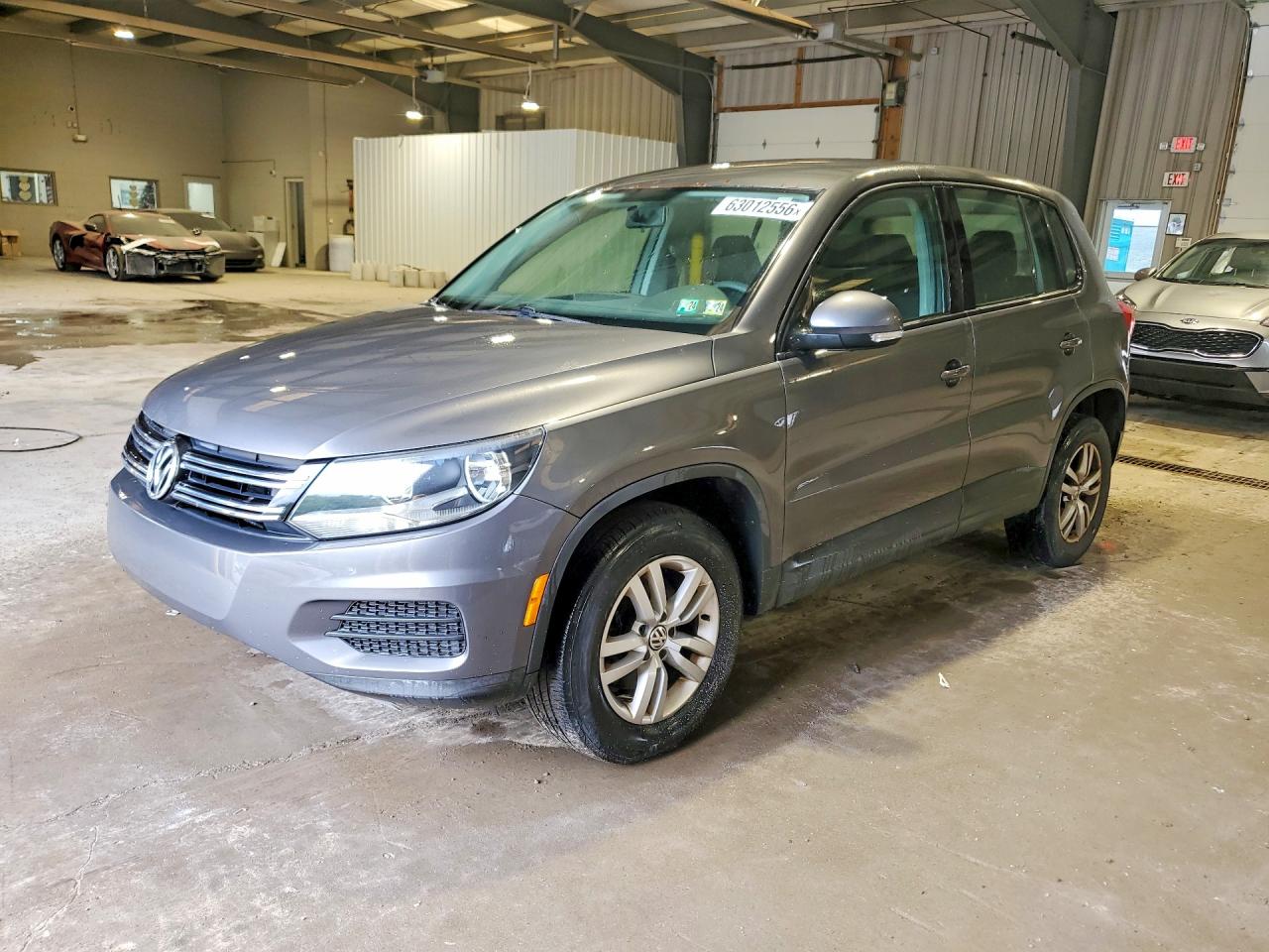 2014 Volkswagen Tiguan S, VIN WVGBV3AXXEW508838 — Мелкие вмятины и царапины