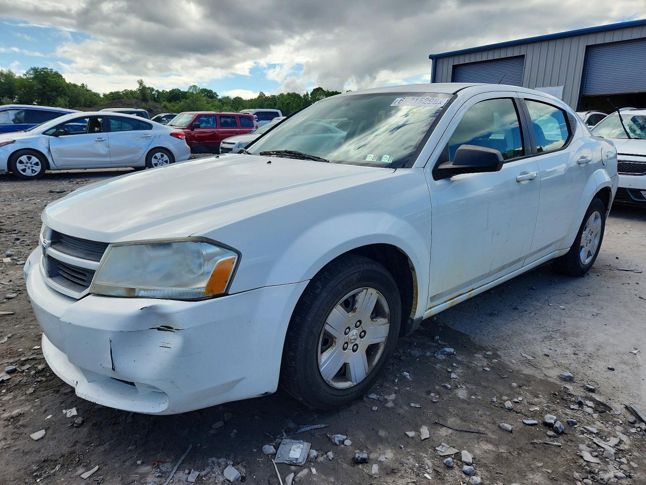 2010 Dodge Avenger SXT, VIN 1B3CC4FB3AN130493 — Зад