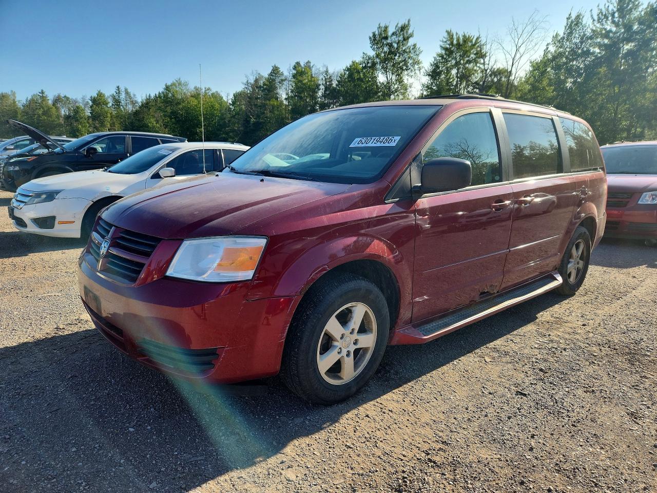 2010 Dodge Grand Caravan SE, VIN 2D4RN4DE1AR471767 — Minor dents and scratches