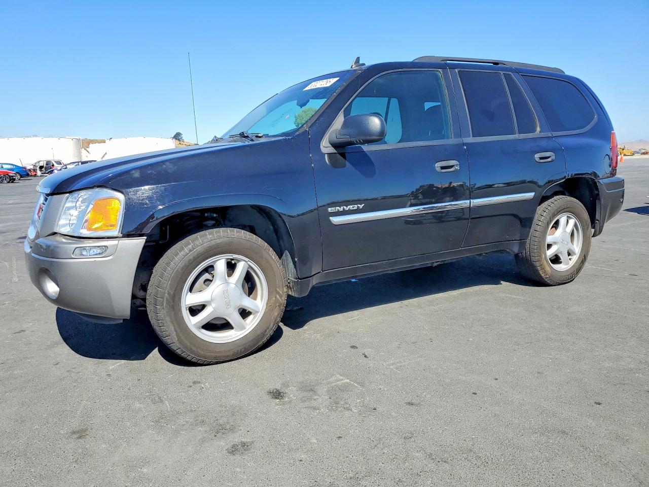 2006 GMC Envoy SLE, VIN 1GKDS13S362332224 — Зад