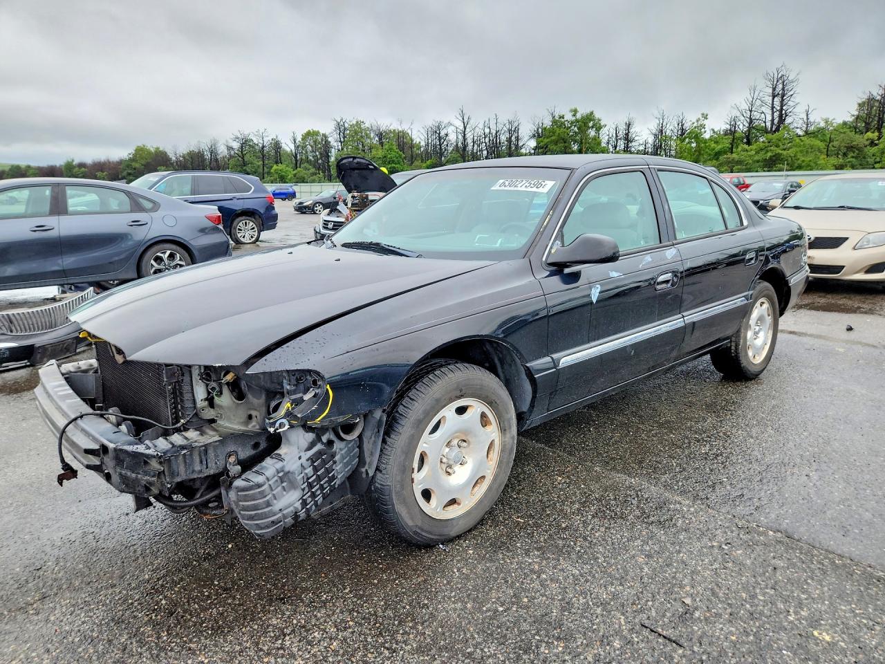 1998 Lincoln Continental, VIN 1LNFM97VXWY704278 — Front end