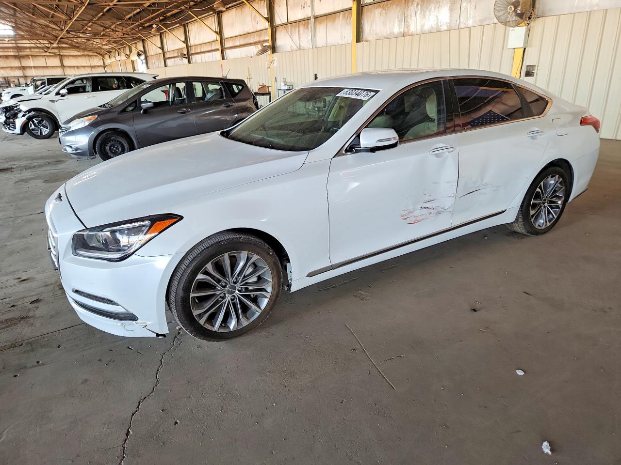 2015 Hyundai Genesis 3.8L, VIN KMHGN4JE7FU076488 — Бок